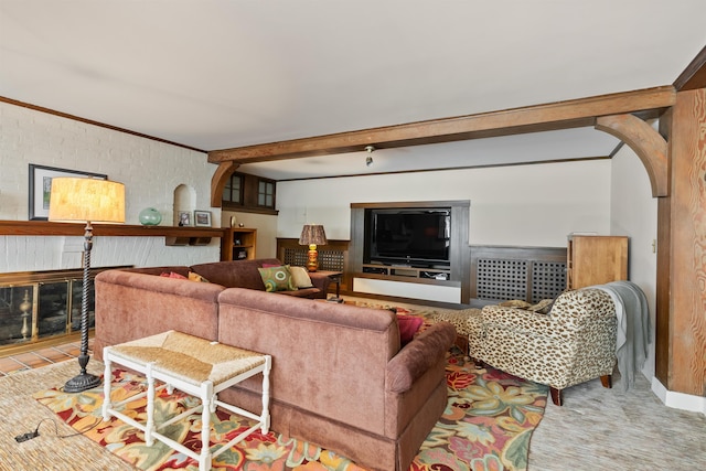 615 E 16th Ave, Spokane, WA 99203 - living room featuring a fireplace, carpet floors, ornamental molding, and arched walkways