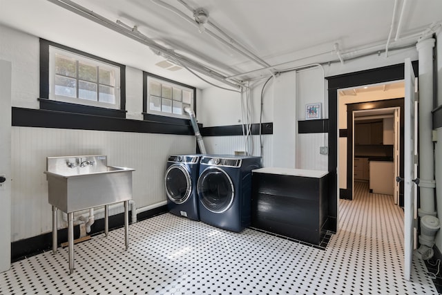 615 E 16th Ave, Spokane, WA 99203 - washroom with wainscoting, laundry area, separate washer and dryer, and a sink