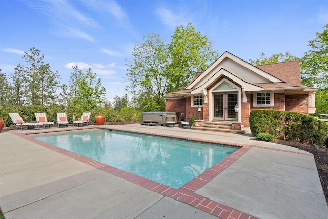 615 E 16th Ave, Spokane, WA 99203 - pool featuring a hot tub, french doors, and a patio area