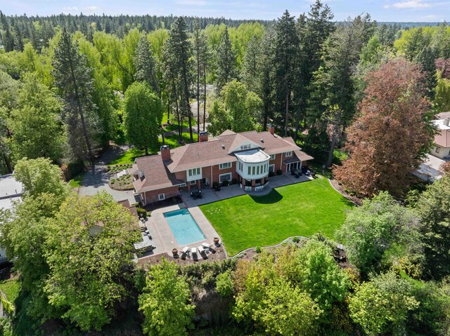615 E 16th Ave, Spokane, WA 99203 - drone / aerial view with a forest view