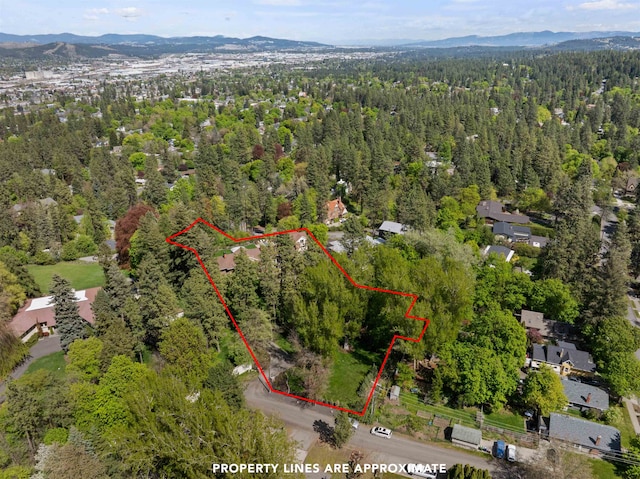 615 E 16th Ave, Spokane, WA 99203 - aerial view featuring a view of trees and a mountain view