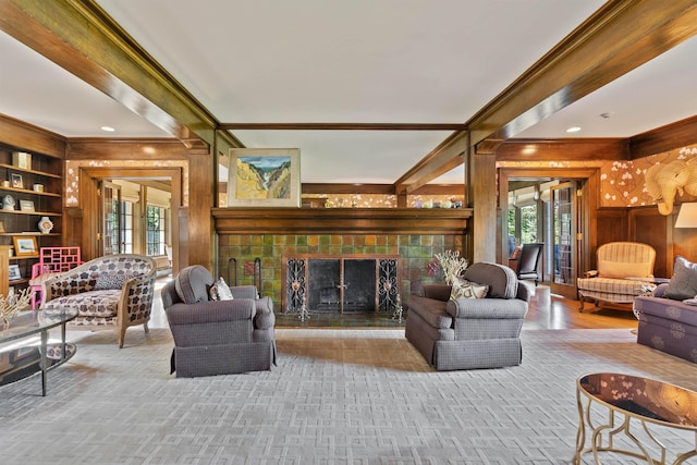 615 E 16th Ave, Spokane, WA 99203 - living area with crown molding, plenty of natural light, a tiled fireplace, and wooden walls