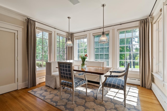 615 E 16th Ave, Spokane, WA 99203 - dining area featuring baseboards, baseboard heating, light wood-type flooring, and visible vents
