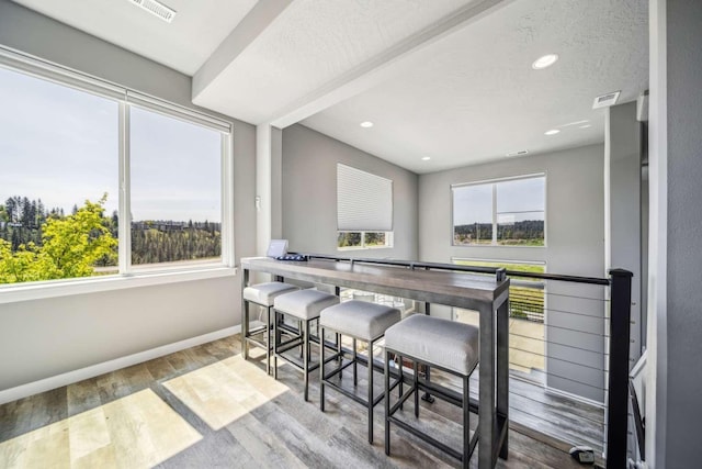 dining space featuring recessed lighting, baseboards, visible vents, and wood finished floors