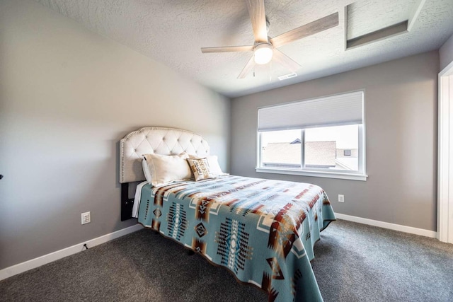 bedroom with carpet, a textured ceiling, and visible vents