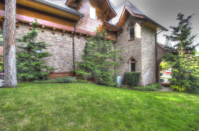 2010 E Pinecrest Rd, Spokane, WA 99203 - view of side of property featuring fence, cooling unit, a yard, and brick siding