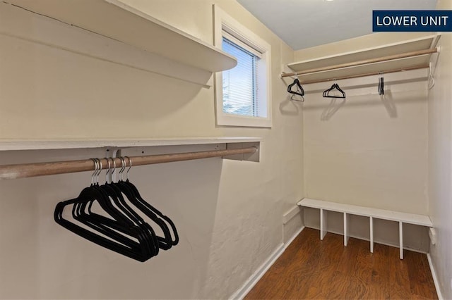 full bath with vanity, toilet, baseboards, wood finished floors, and visible vents