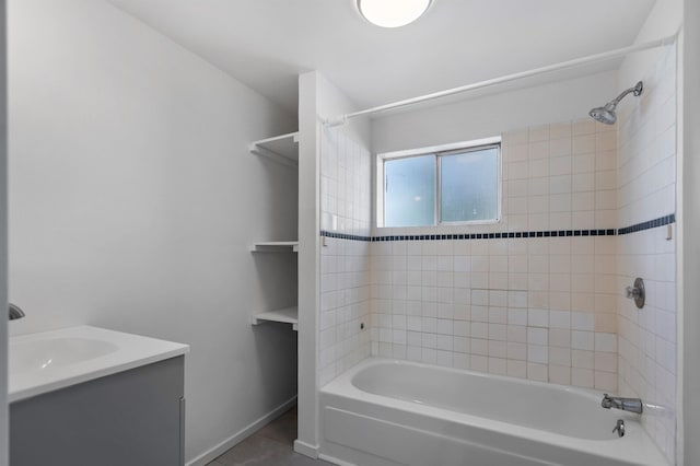 full bath with tub / shower combination, tile patterned flooring, and vanity