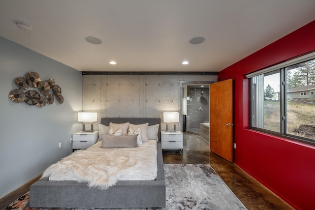 bedroom featuring baseboards, recessed lighting, and finished concrete floors