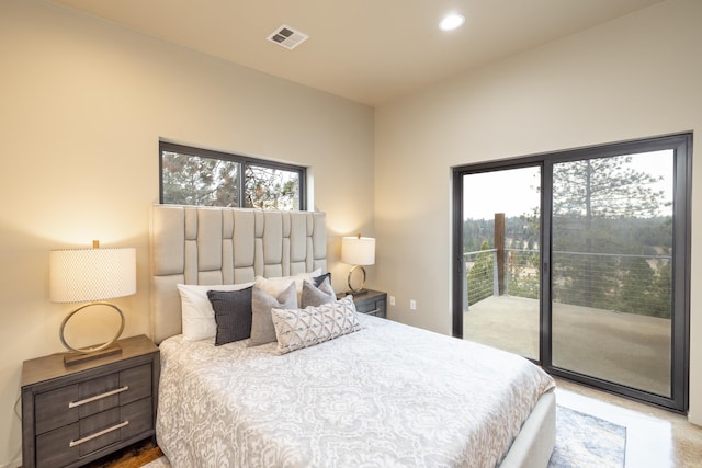 bedroom featuring recessed lighting, visible vents, and access to exterior