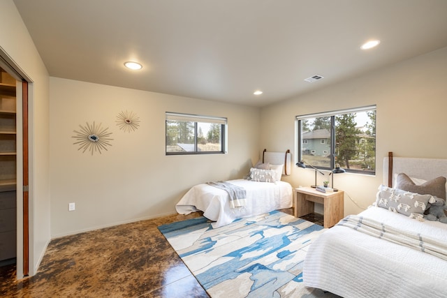bedroom featuring multiple windows, recessed lighting, and visible vents