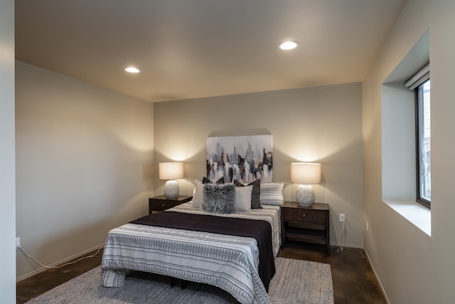 bedroom with baseboards and recessed lighting