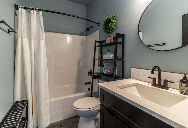 bathroom featuring shower / bath combo with shower curtain, wood finished floors, toilet, and vanity