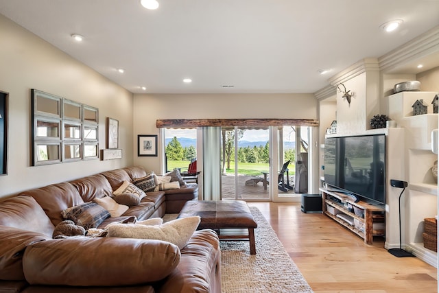 living area featuring recessed lighting and light wood-type flooring
