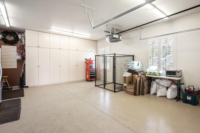 garage featuring a garage door opener