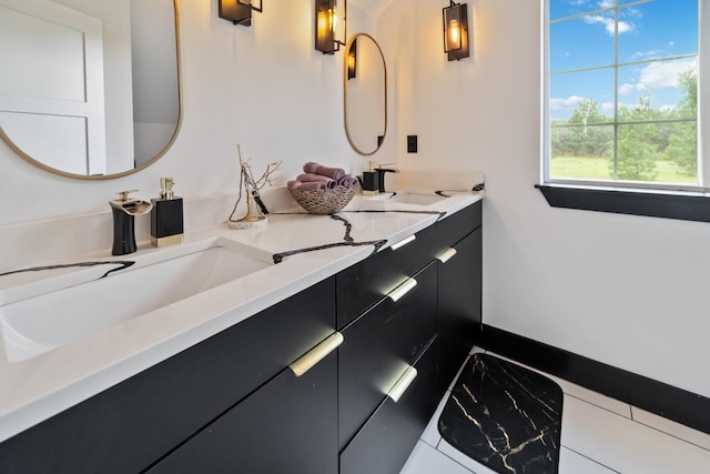 full bathroom featuring double vanity and a sink