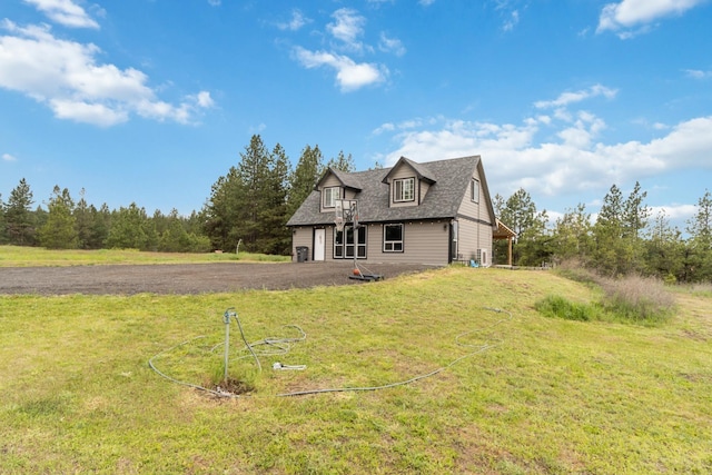view of front of home with a front yard