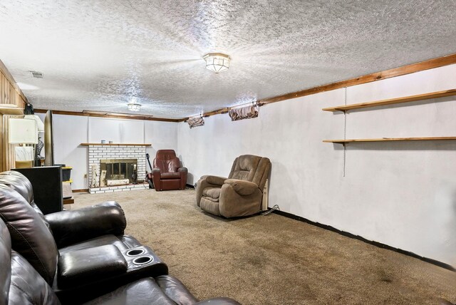 carpeted living room with visible vents, ornamental molding, a fireplace, baseboards, and a textured ceiling