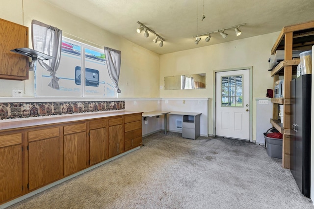 interior space with visible vents and light carpet