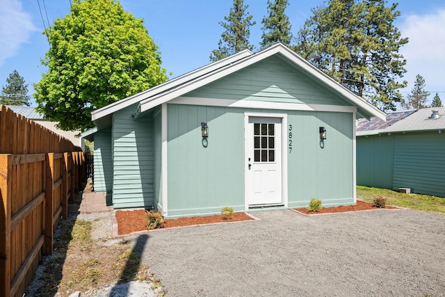 view of outdoor structure with an outdoor structure and fence