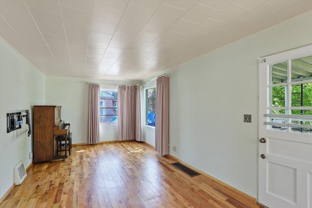 interior space with visible vents and light wood-type flooring