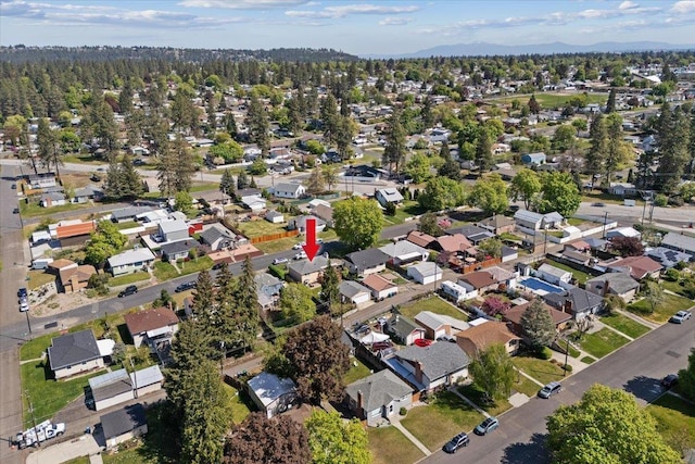 aerial view featuring a residential view and a mountain view