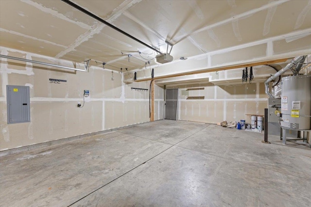 garage with gas water heater, a garage door opener, and electric panel