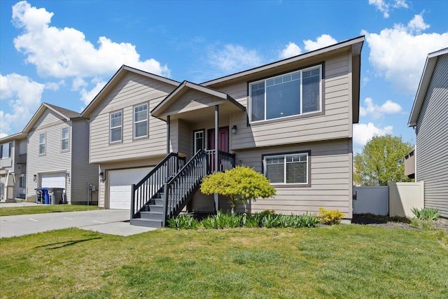 view of front facade with an attached garage, a front lawn, fence, and driveway