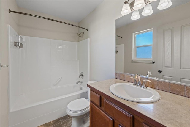 full bath featuring vanity, bathing tub / shower combination, and toilet