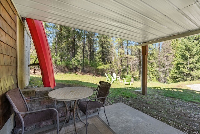 view of patio with outdoor dining area