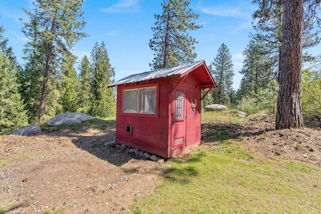 view of outbuilding with an outdoor structure