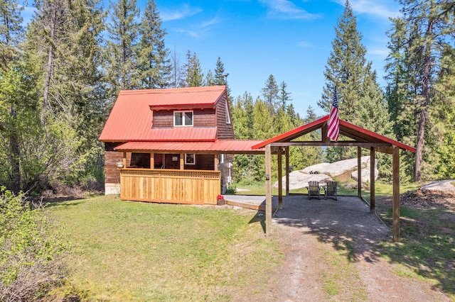 view of outbuilding featuring a gazebo and a carport