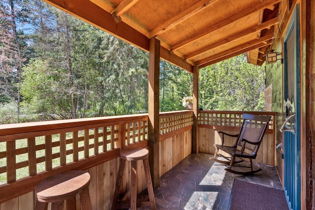 view of wooden balcony featuring a wooden deck