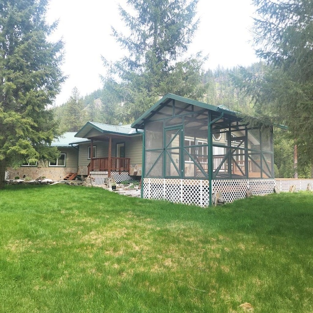 view of home's exterior featuring a lawn