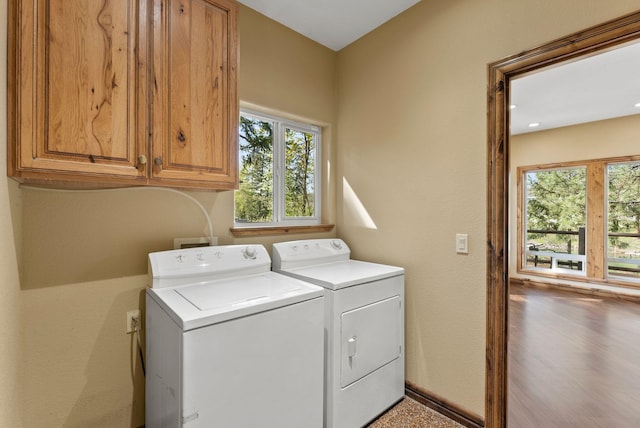 8605 E S Riverway Ave, Spokane, WA 99212 - laundry room with plenty of natural light, cabinet space, and washer and dryer