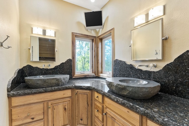 8605 E S Riverway Ave, Spokane, WA 99212 - bathroom with double vanity and a sink