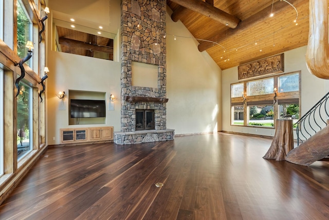 8605 E S Riverway Ave, Spokane, WA 99212 - unfurnished living room with wooden ceiling, beamed ceiling, high vaulted ceiling, and wood finished floors