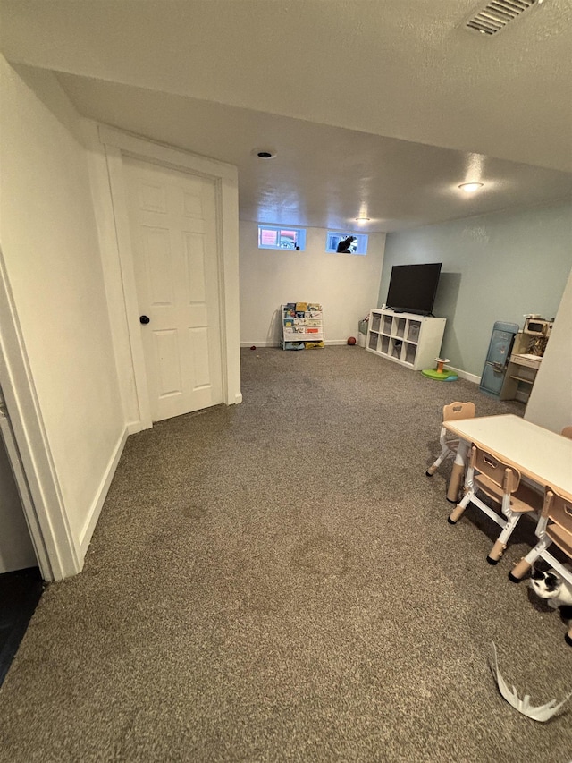 3204 W Queen Pl, Spokane, WA 99205 - interior space with visible vents, baseboards, and dark carpet