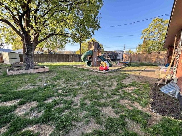 3204 W Queen Pl, Spokane, WA 99205 - view of yard with a fenced backyard and a playground