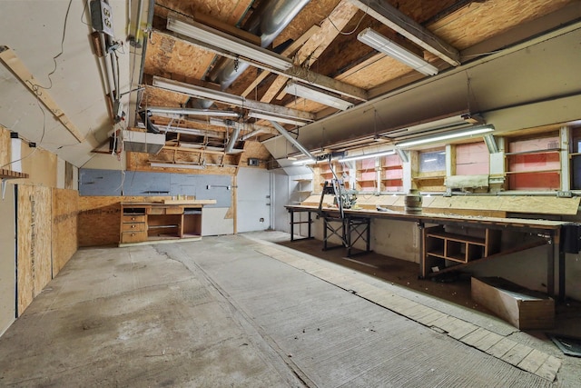 miscellaneous room featuring a workshop area