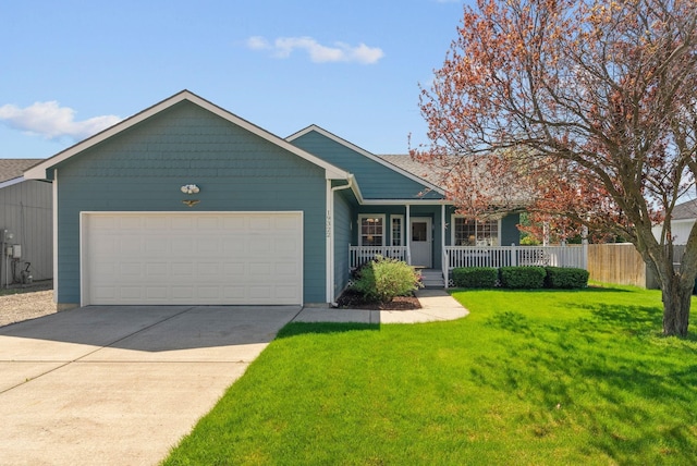 19322 E Indiana Ave, Greenacres, WA 99016 - ranch-style house with covered porch, fence, driveway, a garage, and a front yard