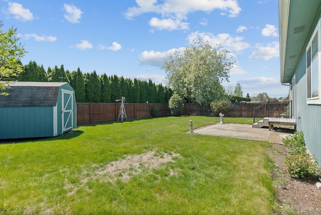 19322 E Indiana Ave, Greenacres, WA 99016 - view of yard featuring an outbuilding, a patio, a shed, and a fenced backyard