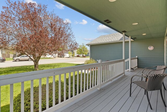 19322 E Indiana Ave, Greenacres, WA 99016 - wooden deck featuring a lawn and a porch