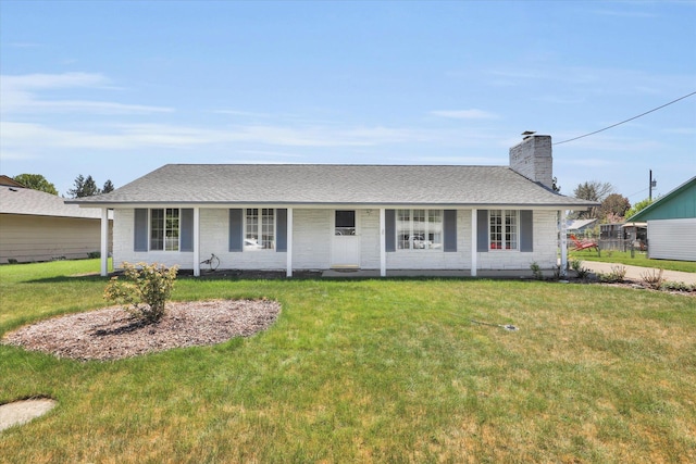 ranch-style home featuring a front lawn, a porch, roof with shingles, and a chimney