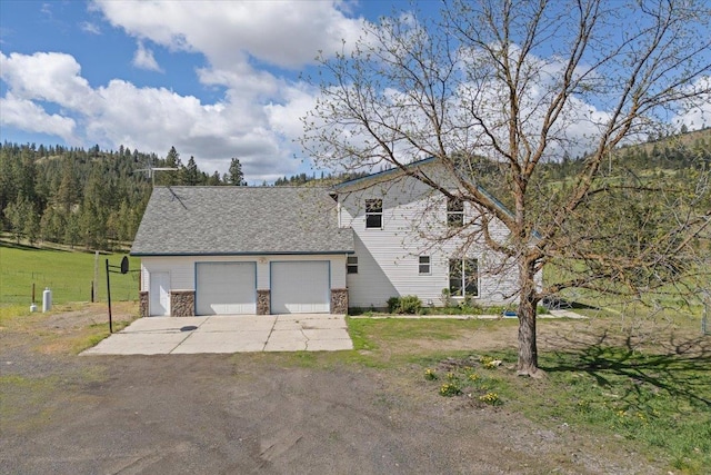 42480 N State Route 25th Hwy, Davenport, WA 99122 - view of front of property with a garage and a front lawn