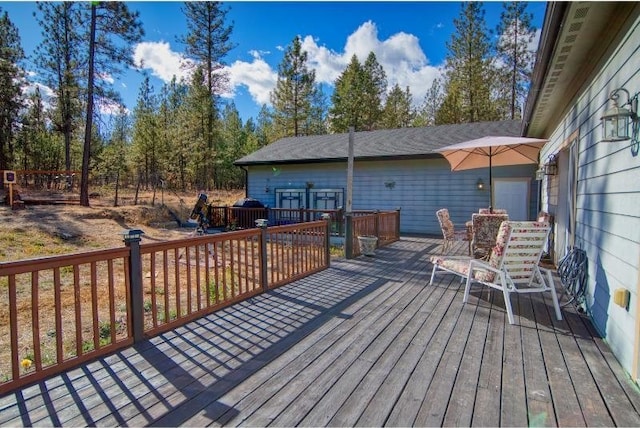 deck featuring outdoor dining space