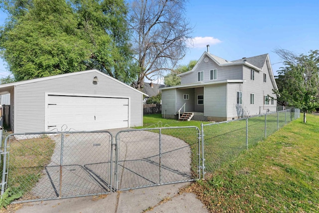 1801 W Sharp Ave, Spokane, WA 99201 - view of front facade with a detached garage, an outbuilding, and a gate