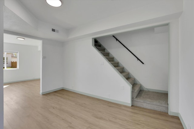 1801 W Sharp Ave, Spokane, WA 99201 - below grade area with wood finished floors and stairway