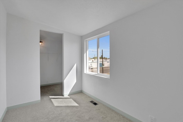 1801 W Sharp Ave, Spokane, WA 99201 - empty room with carpet floors and baseboards