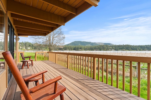 3247 Jumpoff Way, Valley, WA 99181 - wooden deck featuring a wooded view and a mountain view